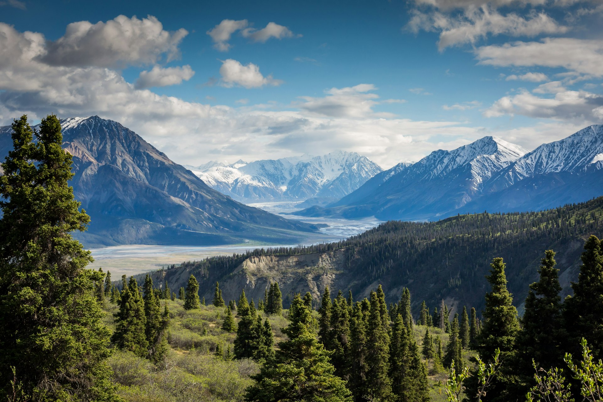 Mountains and sky — the ground stretching out under heaven.